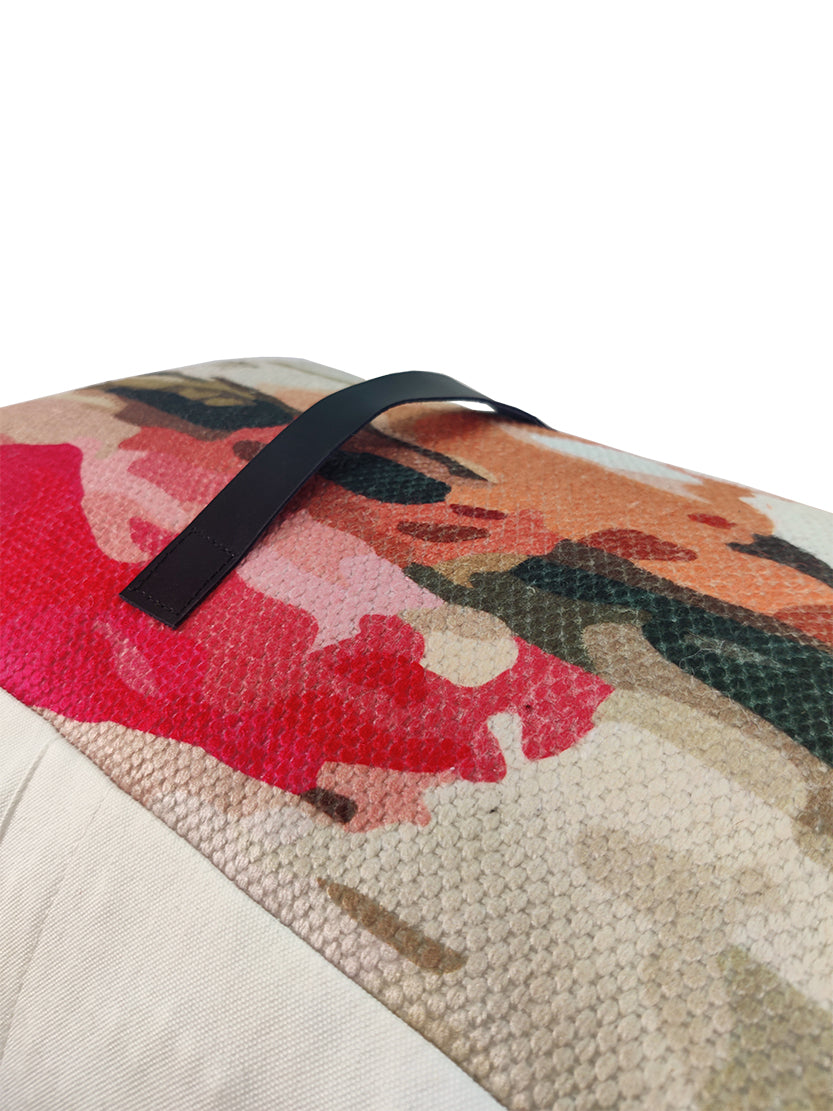 Detailed view of handmade pouf PF-122 highlighting colorful pattern and woven texture