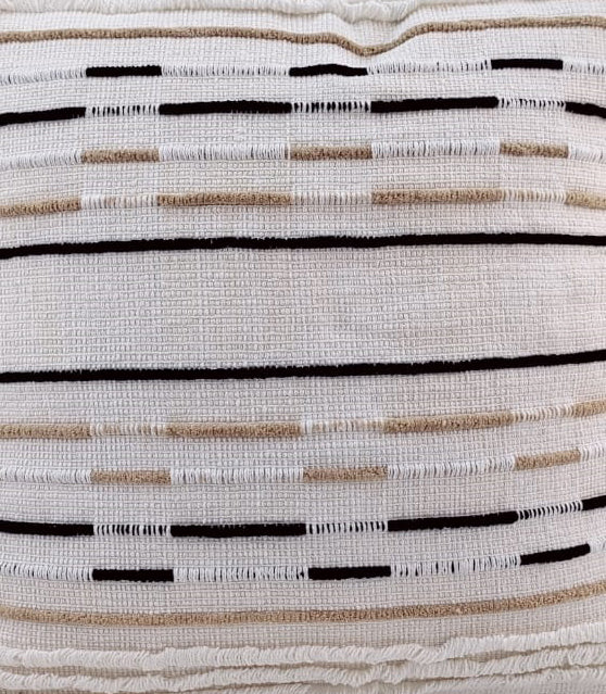 Close-up of the RAMSHA HOME Woven Cotton Cushion With Tassel cs-151, featuring horizontal black and beige lines and dashes on an off-white background—a simple, modern geometric cotton-acrylic design with a plush insert.
