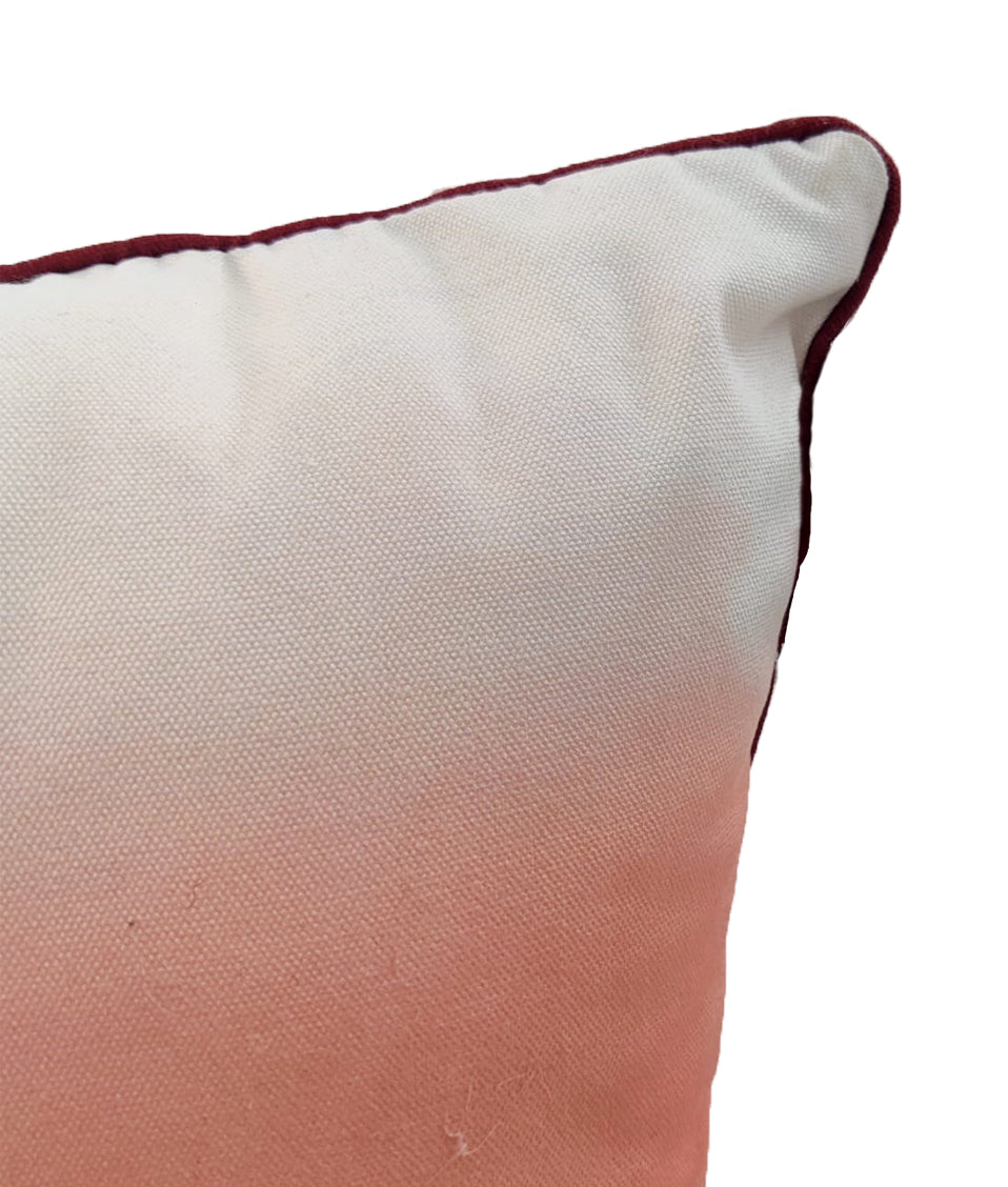 The RAMSHA HOME Gradient Pattern Cushion CS-272 features an off-white to light pink fade, dark maroon trim, and a removable insert—an elegant accent for stylish home decor.