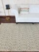 Handcrafted natural white color woven rug with fringes SRN 007 (170x240cm) by Ramsha Home