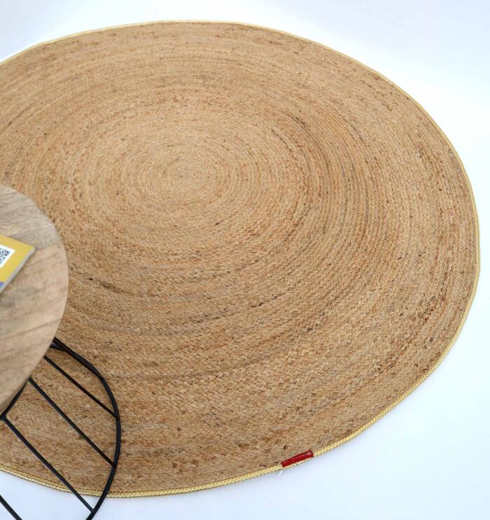 Natural braided jute rugs showcasing eco-friendly design, durability, and timeless rustic charm