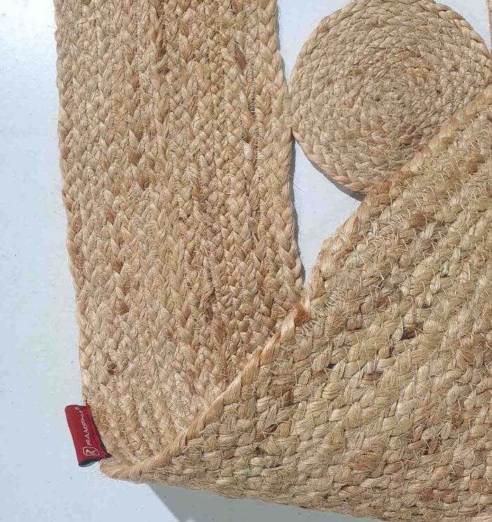 Close-up of Handwoven Braided Jute Floor Rug - Natural Fiber by Ramsha Home