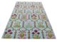 Vibrant handcrafted wool rug in multi colors