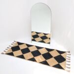 Braided rug showcasing timeless weaving, rustic charm, and durable craftsmanship.