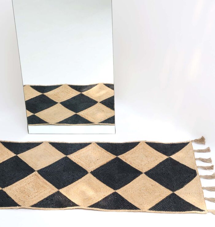 Braided rug showcasing timeless weaving, rustic charm, and durable craftsmanship.