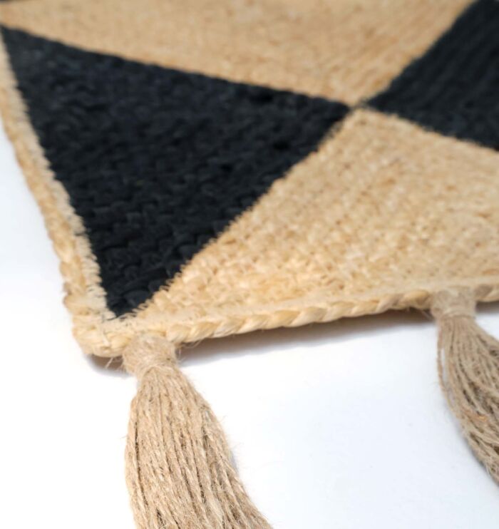 Braided rug showcasing timeless weaving, rustic charm, and durable craftsmanship.