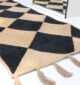 Braided rug showcasing timeless weaving, rustic charm, and durable craftsmanship.