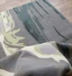 Hand-tufted rug with elegant design, soft texture, and durable craftsmanship for home décor.