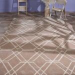 Elegant handmade silk rug in a stylish living room, from a top carpet store in Dubai, offering the finest rugs UAE.