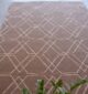 Elegant handmade silk rug in a stylish living room, from a top carpet store in Dubai, offering the finest rugs UAE.