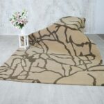 Beautiful handmade silk carpet enhancing a modern living room, from a leading carpet store in Dubai, showcasing the finest rugs UAE.