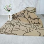 Beautiful handmade silk carpet enhancing a modern living room, from a leading carpet store in Dubai, showcasing the finest rugs UAE.