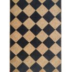 Handmade jute rug living room with black and natural braided design.