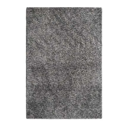 Luxurious shaggy rug with deep pile, soft touch, and elegant design for stylish interiors.