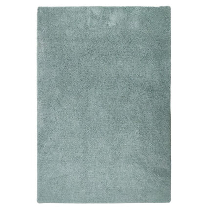 Luxurious shaggy rug with deep pile, soft touch, and elegant design for stylish interiors.