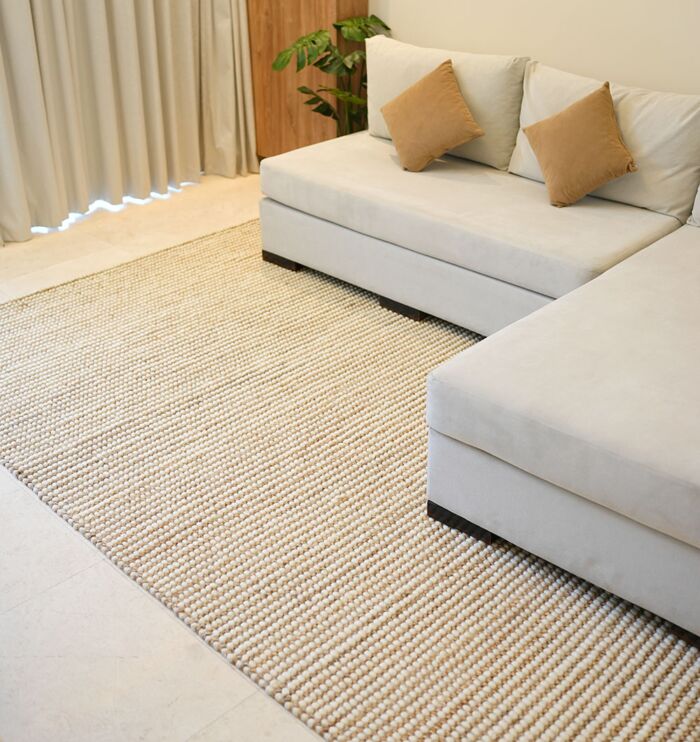 Hand woven wool hallway rug from India, stylish bohemian woven rug for homes in UAE and Dubai.