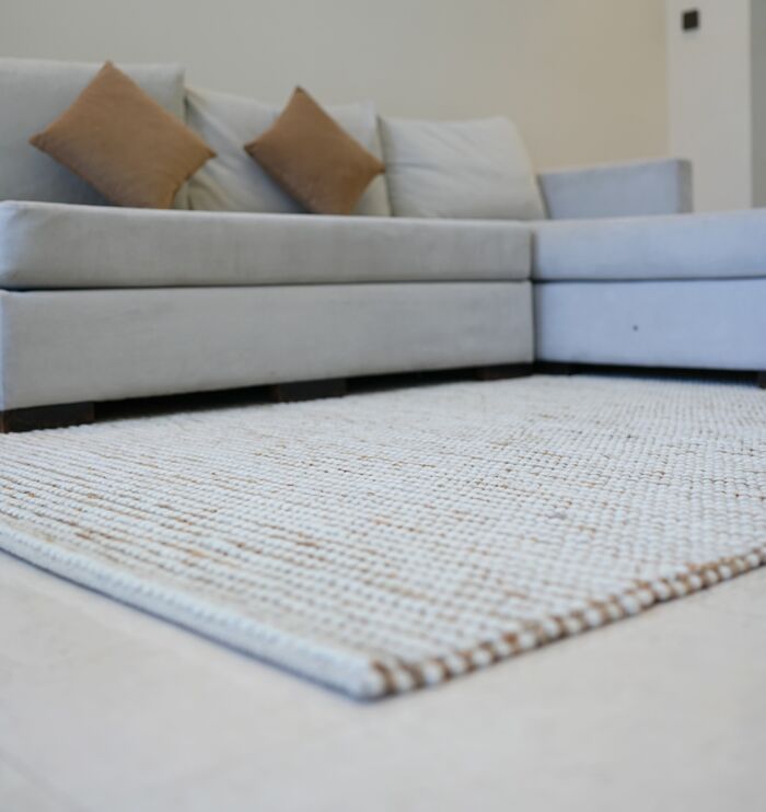 Hand woven wool hallway rug from India, stylish bohemian woven rug for homes in UAE and Dubai.