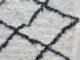 Close-up View of Ramsha Home's White and Black Line Shaggy Rug - Polyester & Cotton Blend - 150 CM Round