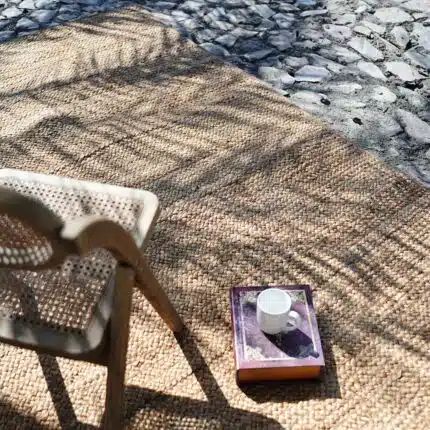Handcrafted natural jute rug for living rooms, outdoor patios, and modern homes in UAE.
