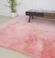 Soft shaggy rug with plush texture, modern design, and cozy comfort for home décor.