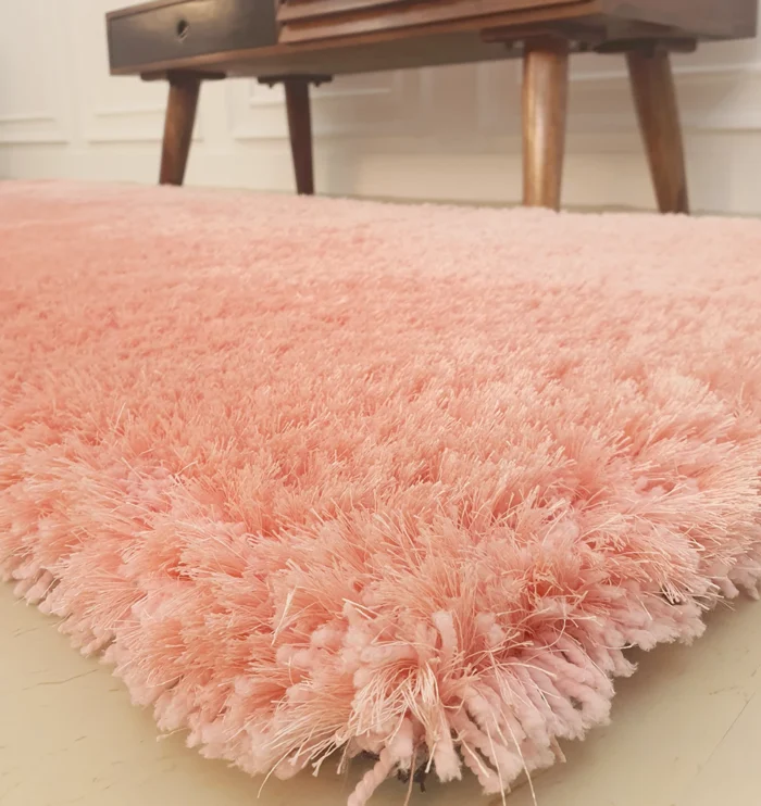 Soft shaggy rug with plush texture, modern design, and cozy comfort for home décor.