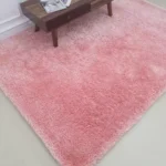Soft shaggy rug with plush texture, modern design, and cozy comfort for home décor.