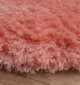Shaggy rug with fluffy texture, soft feel, and modern design for cozy home interiors.