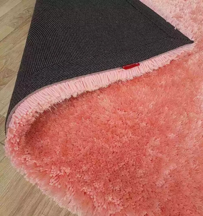 Soft shaggy rug with plush texture, modern design, and cozy comfort for home décor.