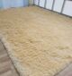 Sideways View of Beige Handmade Shaggy Rug - Ramsha Home