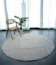 Luxury handmade rug Dubai, circular tufted carpet for living room and bedroom, stylish rugs UAE home décor.