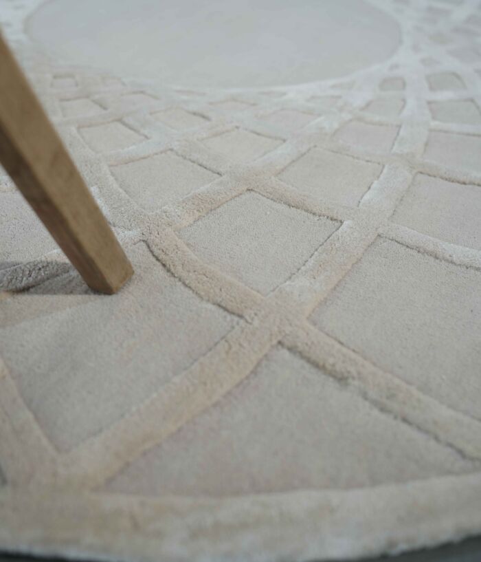 Luxury handmade rug Dubai, circular tufted carpet for living room and bedroom, stylish rugs UAE home décor.