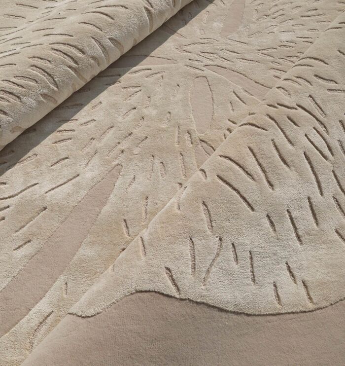 Handmade rug highlighting exquisite weaving, artisanal craftsmanship, and timeless elegance