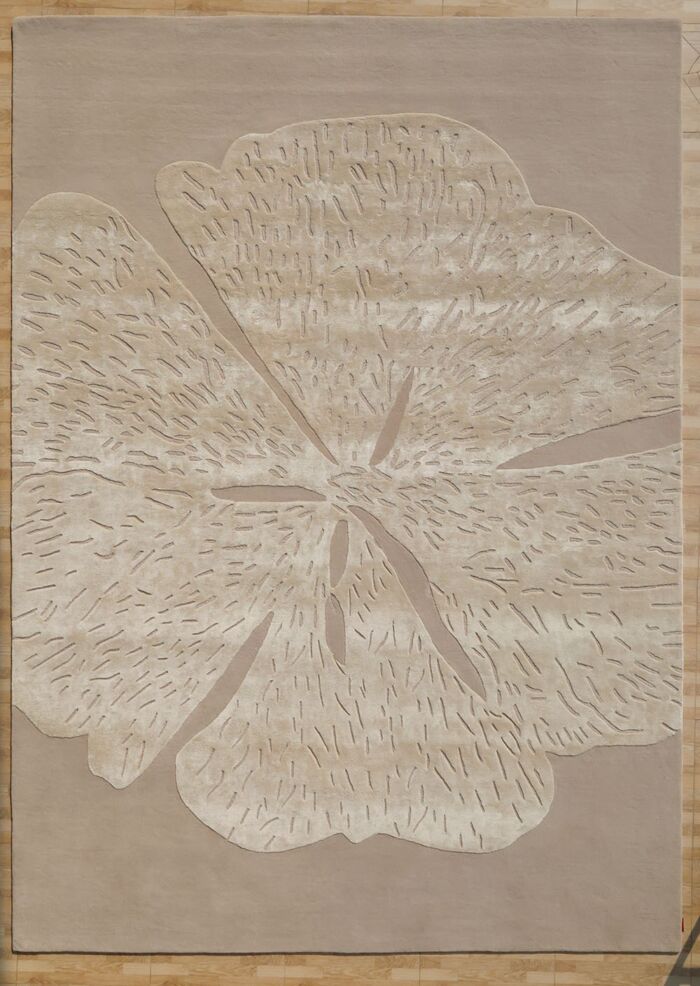 Handmade rug highlighting exquisite weaving, artisanal craftsmanship, and timeless elegance