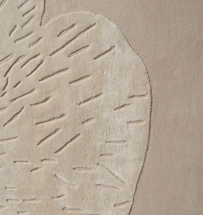 Handmade rug highlighting exquisite weaving, artisanal craftsmanship, and timeless elegance
