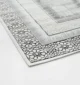 Durable machine-made rug with modern patterns, soft finish, and versatile design for home décor.