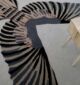 Handmade rug highlighting traditional weaving, timeless artistry, and refined craftsmanship