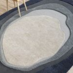 Handmade rug highlighting exquisite weaving, artisanal craftsmanship, and timeless elegance