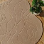 Handmade rug showcasing craftsmanship, rich texture, and timeless style.