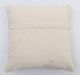 White decorative cushion with soft fabric and elegant design