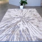 Machine-made rug with durable construction, stylish design, and easy-care comfort for modern homes.