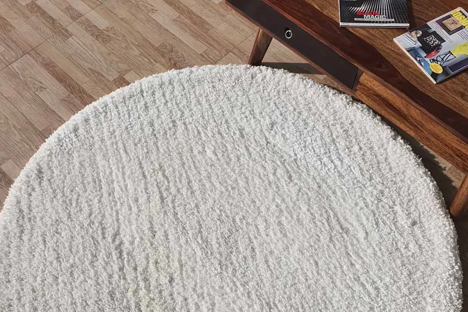 Soft plush rug in a cozy living room setting, perfect for adding comfort and style.