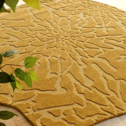 Handmade wool rug with intricate design, soft texture, and timeless decorative appeal for home interiors.