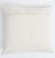 Natural white macrame cushion with handcrafted detailing, soft texture, and stylish home décor appeal.