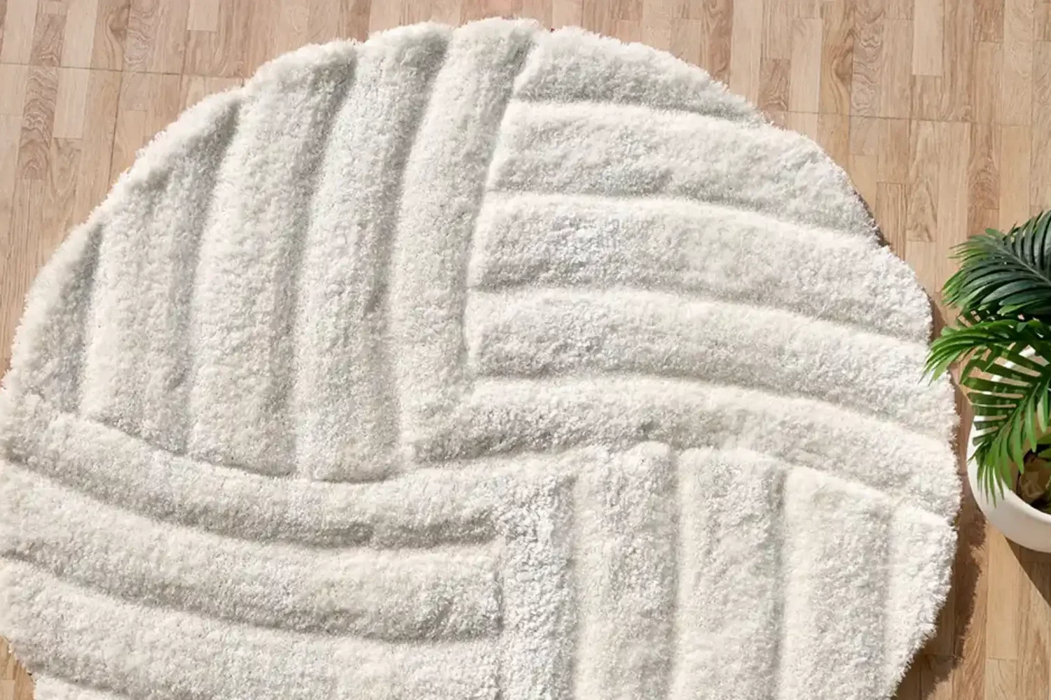 Affordable home makeover Dubai featuring layered Ramsha Carpets, stylish lighting, and chic wall décor.