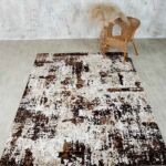 Machine-made rug with durable construction, stylish design, and easy-care comfort for modern homes.