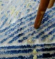 Machine-made rug featuring precision weaving, elegant style, and durable quality for everyday living.