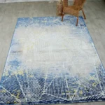 Machine-made rug featuring precision weaving, elegant style, and durable quality for everyday living.