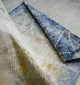 Machine-made rug featuring precision weaving, elegant style, and durable quality for everyday living.