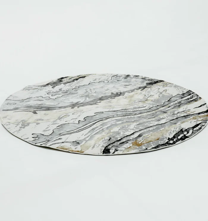 Durable machine-made rug with modern patterns, soft finish, and versatile design for home décor.
