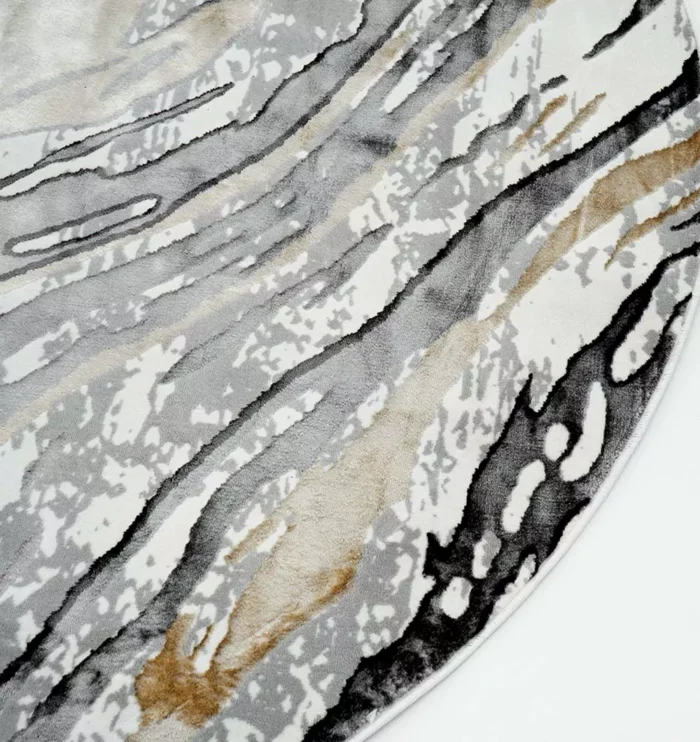 Durable machine-made rug with modern patterns, soft finish, and versatile design for home décor.